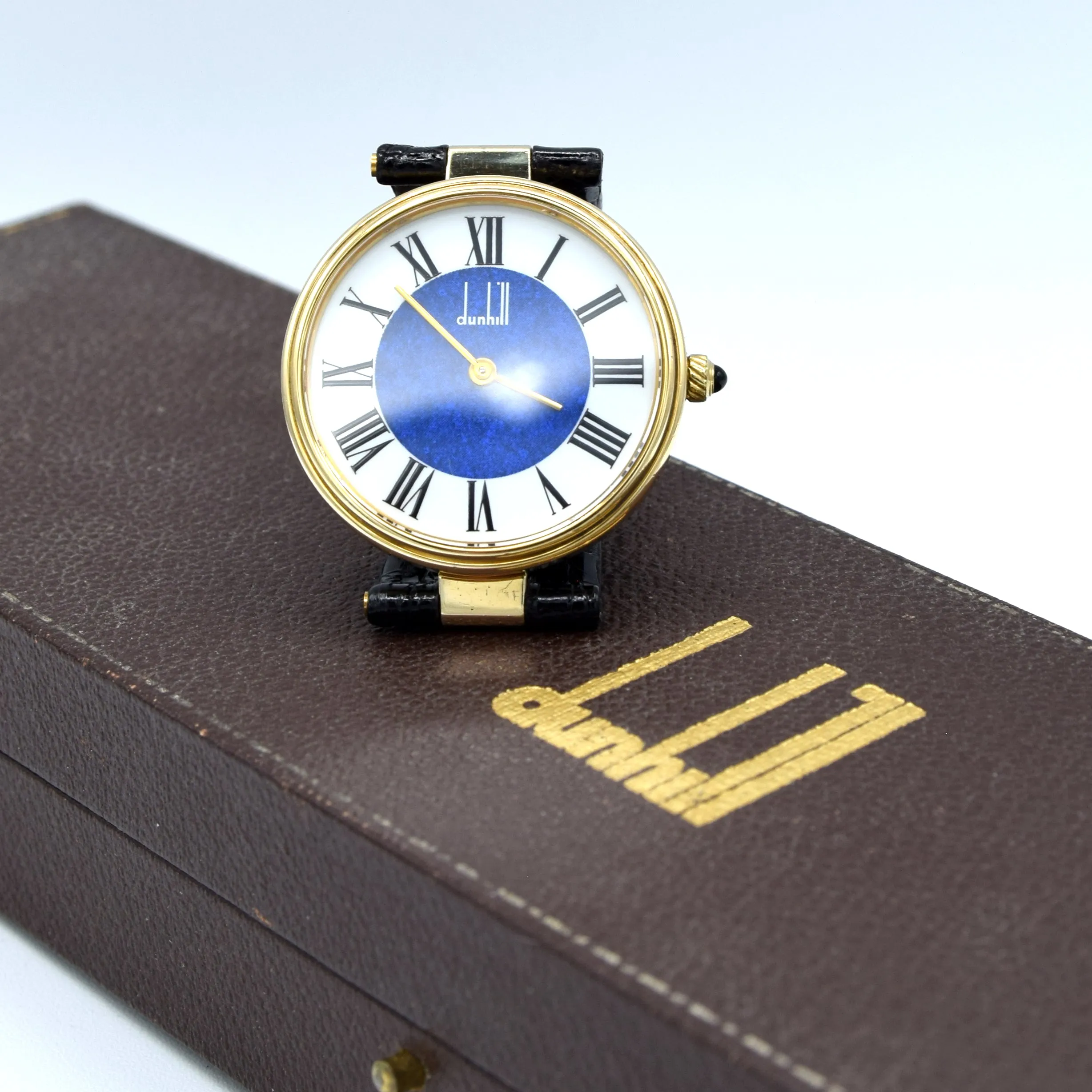 1980 Alfred Dunhill silver 925 sterling 'Blue Bulls eye' swiss quartz dress Wristwatch with strap - buckle - box